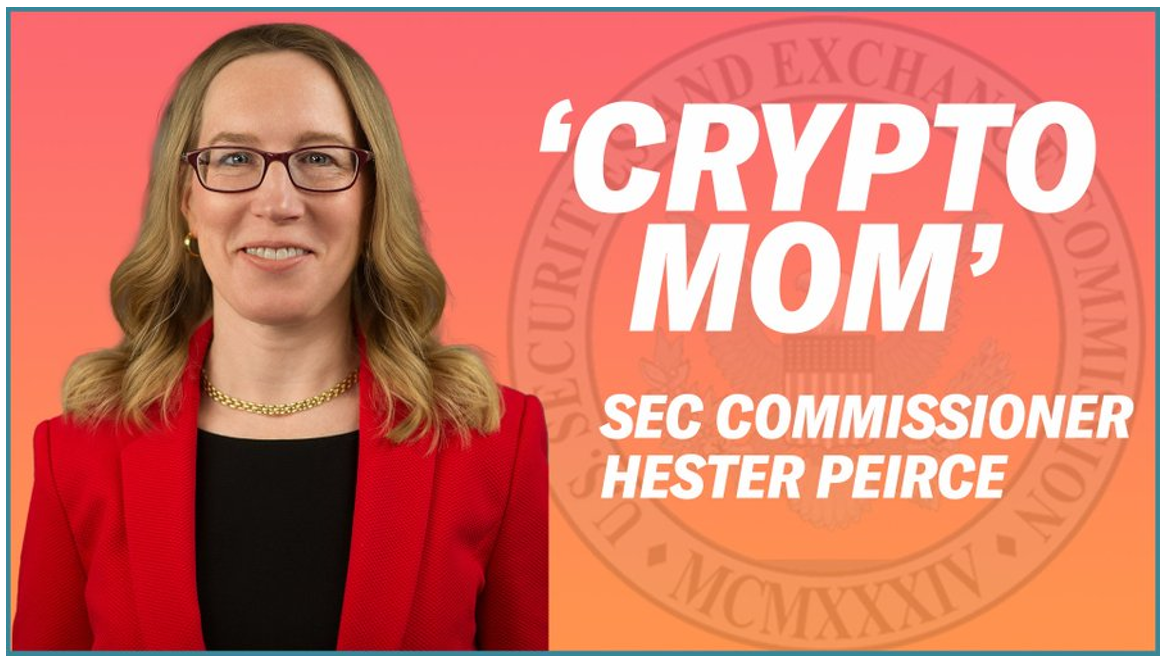 hester peirce with crypto mom sign in the background