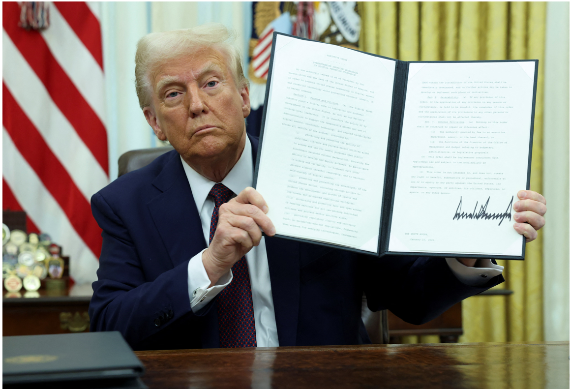 trump holding up his crypto executive order